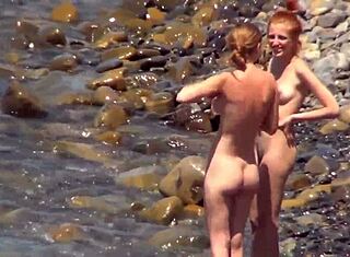 Mature and young couple swap partners in public outdoor orgy